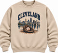 Cleveland baseball glove and skyline design on a sand crewneck