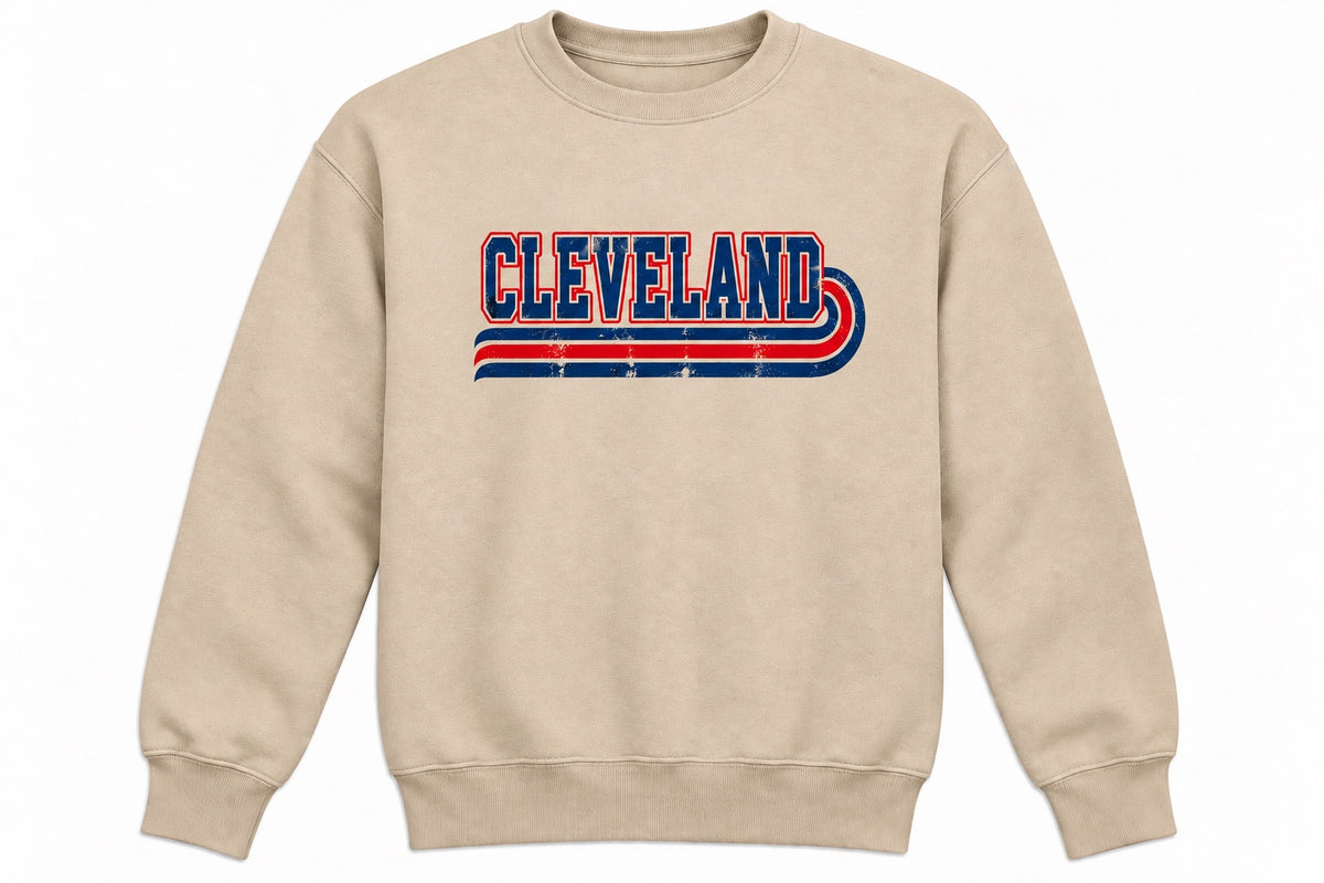 Retro Cleveland stripe design in navy and red on a sand crewneck sweatshirt