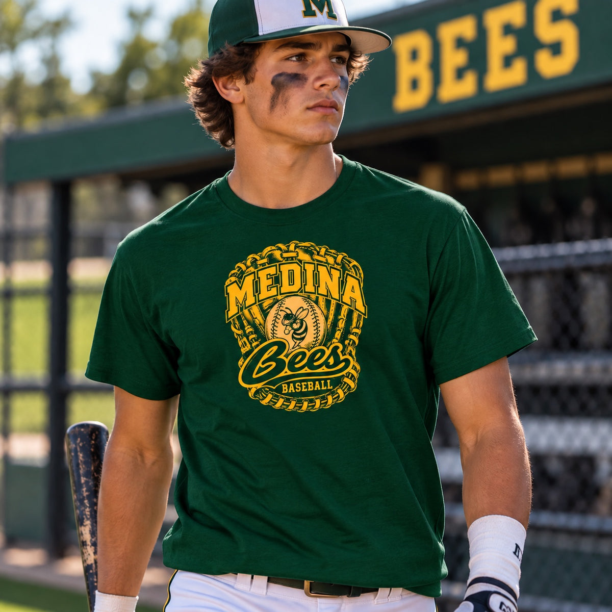 Medina Bees baseball mitt design on a dark green T-shirt