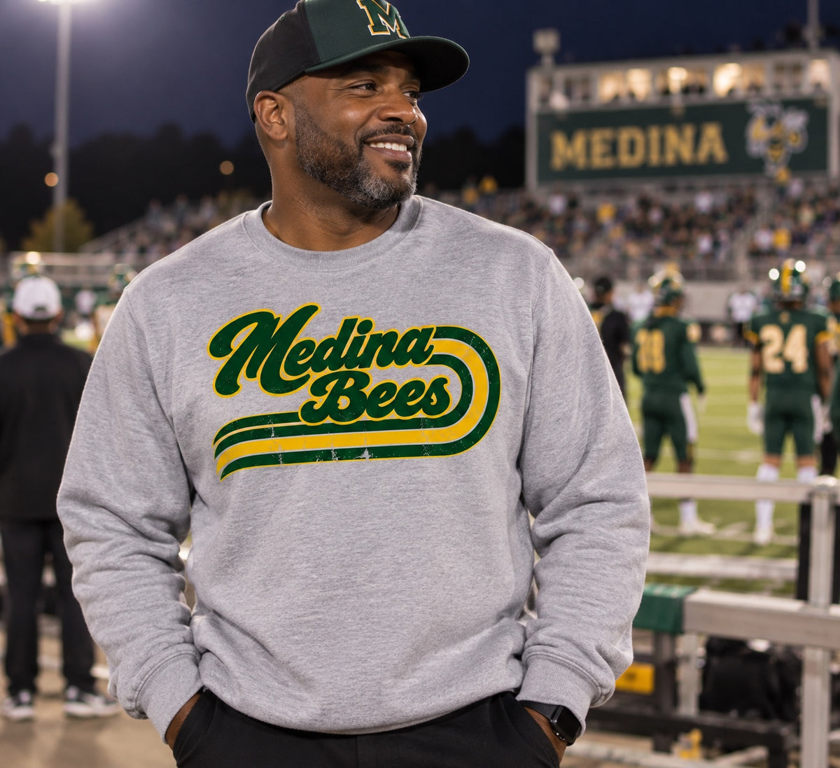 Medina Bees retro script on a heather gray crewneck sweatshirt
